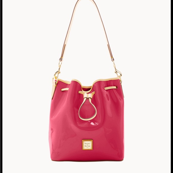 Dooney & Bourke Handbags - Dooney and Bourke pink patin leather drawstring bag